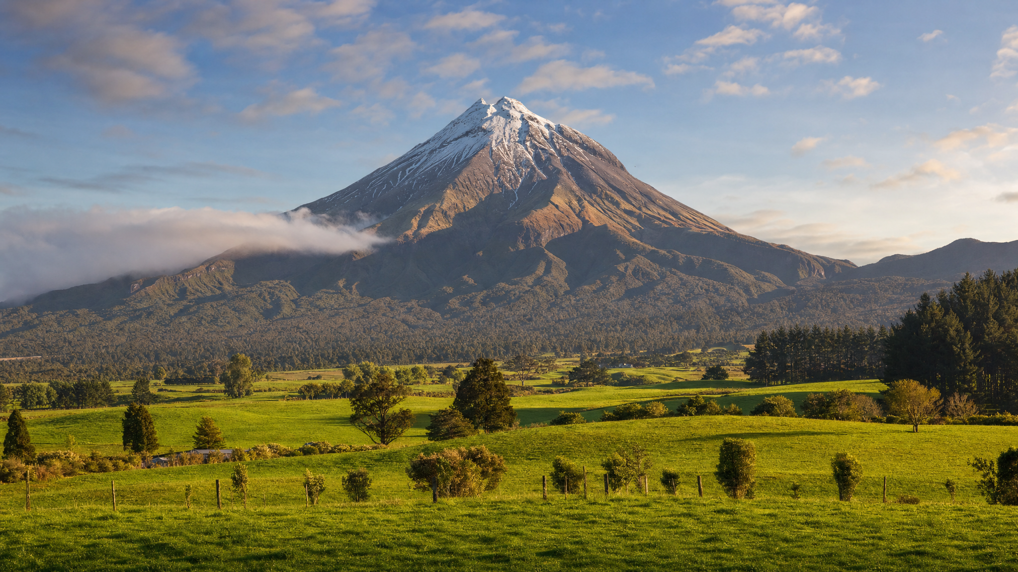 Mount Taranaki rising above the Taranaki landscape